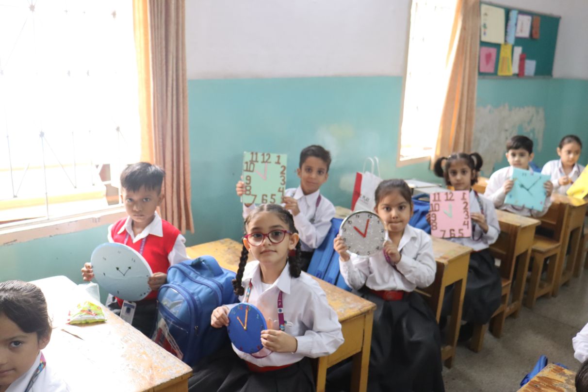 STUDENTS ENHANCE THEIR COGNITIVE SKILLS WITH CLOCK MAKING ACTIVITY